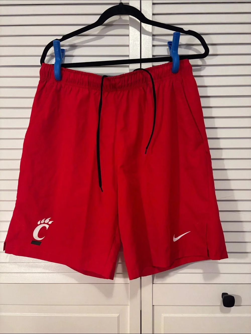 Nike Men's Red Athletic Drawstring Shorts with White Swoosh